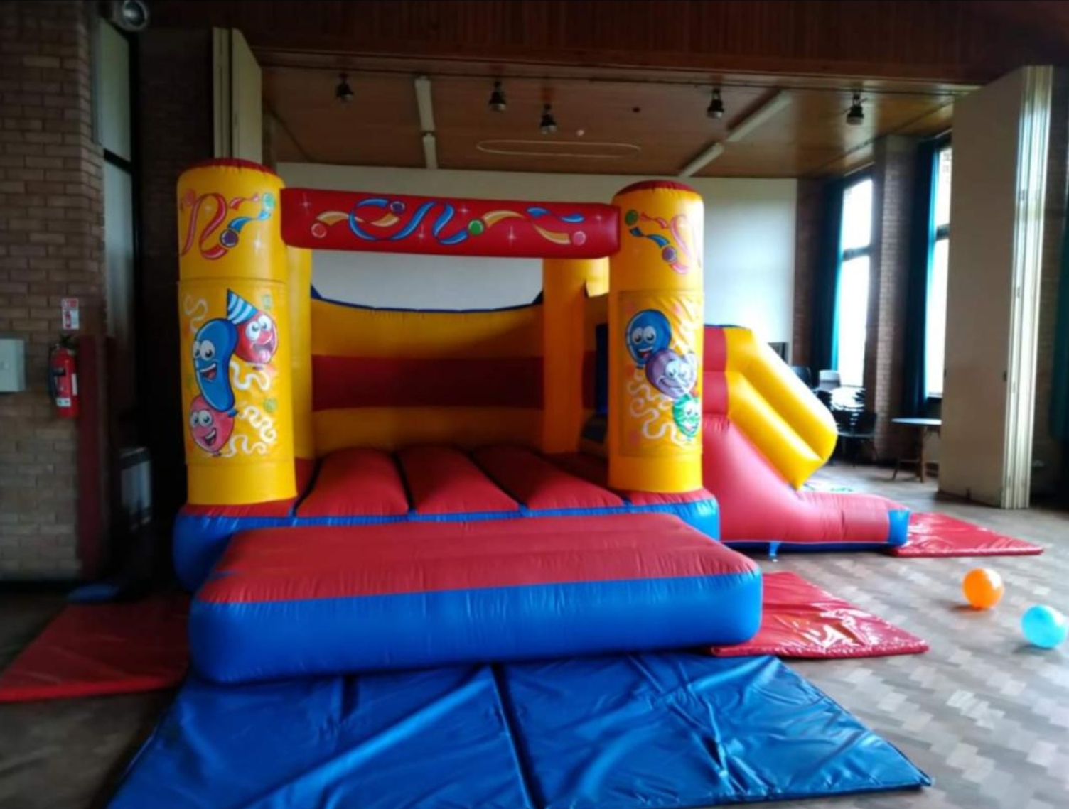 Indoor Only Castle Red & Yellow With Side Slide Happy Balloons